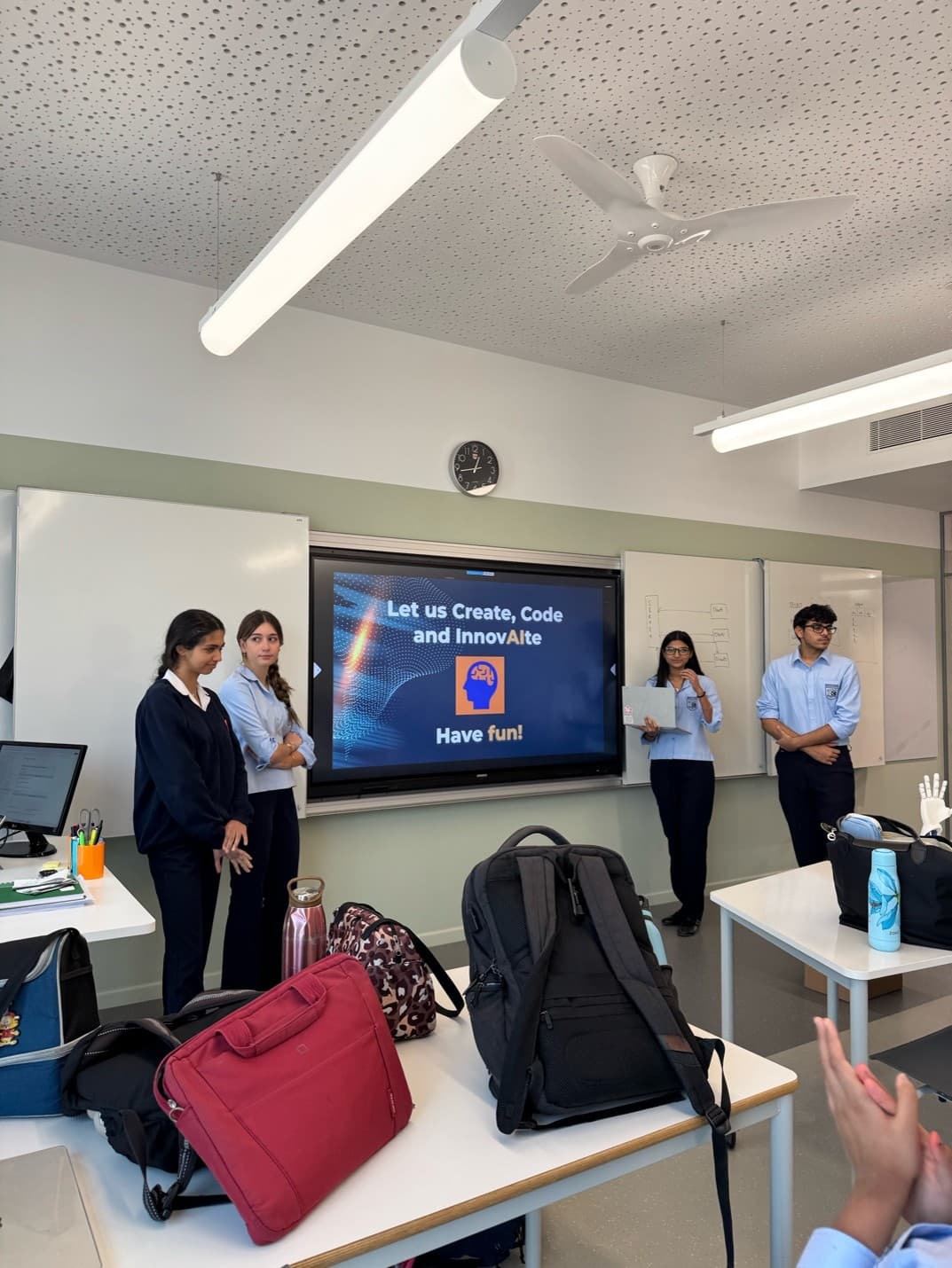 Students presenting at the InnovAIte hackathon